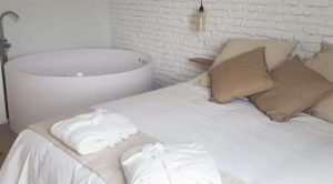 Apartamentos en Mélida con Jacuzzi